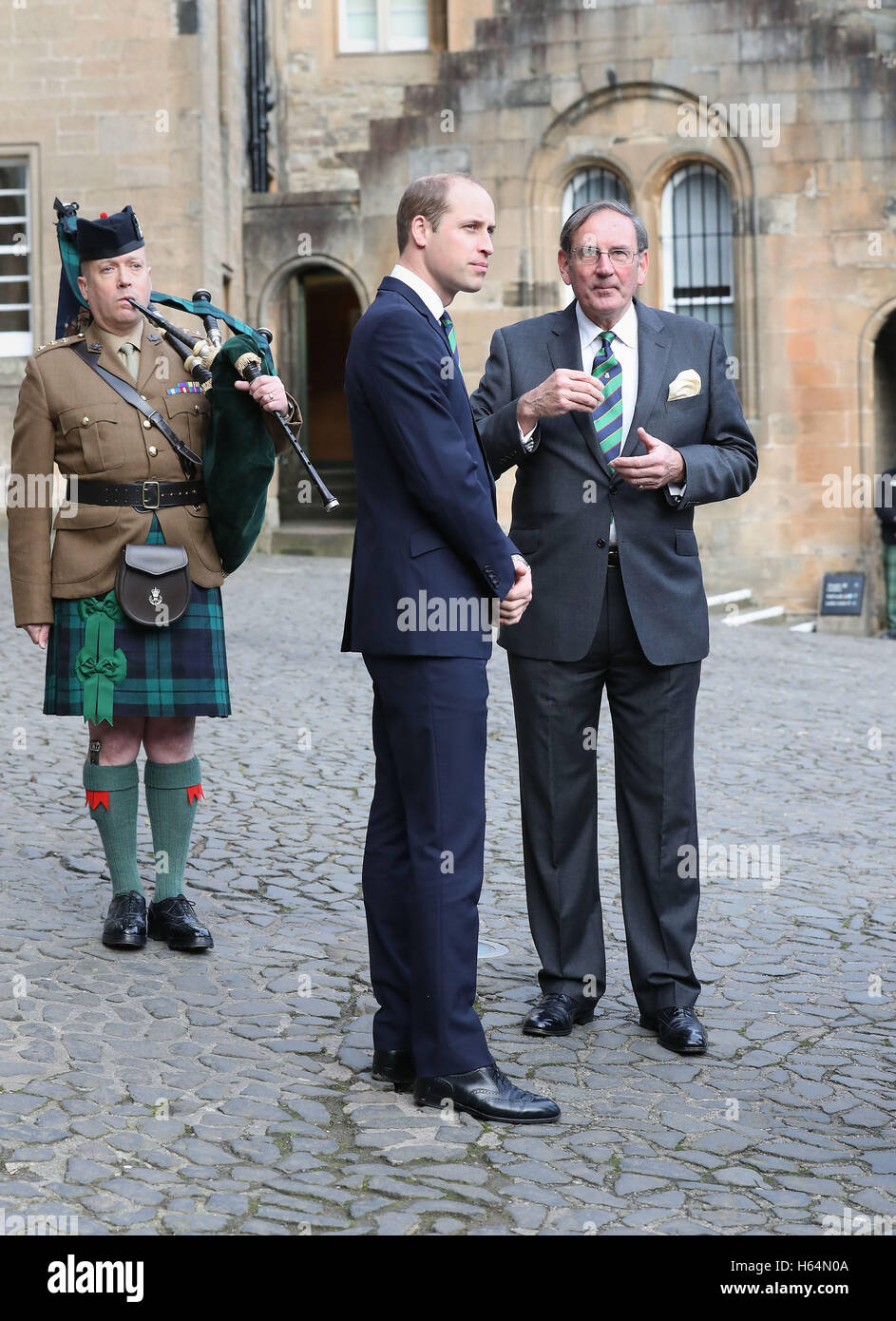 The Duke of Cambridge, known as the Earl of Strathearn in Scotland (centre) talks to project director Col AK Miller (right) as he arrives at Argyll and Sutherland Highlanders Regimental Museum at Stirling Castle. Stock Photo