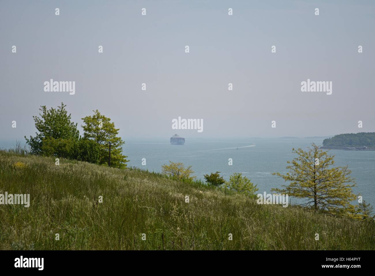 A cargo ship sailing into the Boston Seaport Cargo Terminal in South Boston, Massachusetts Stock