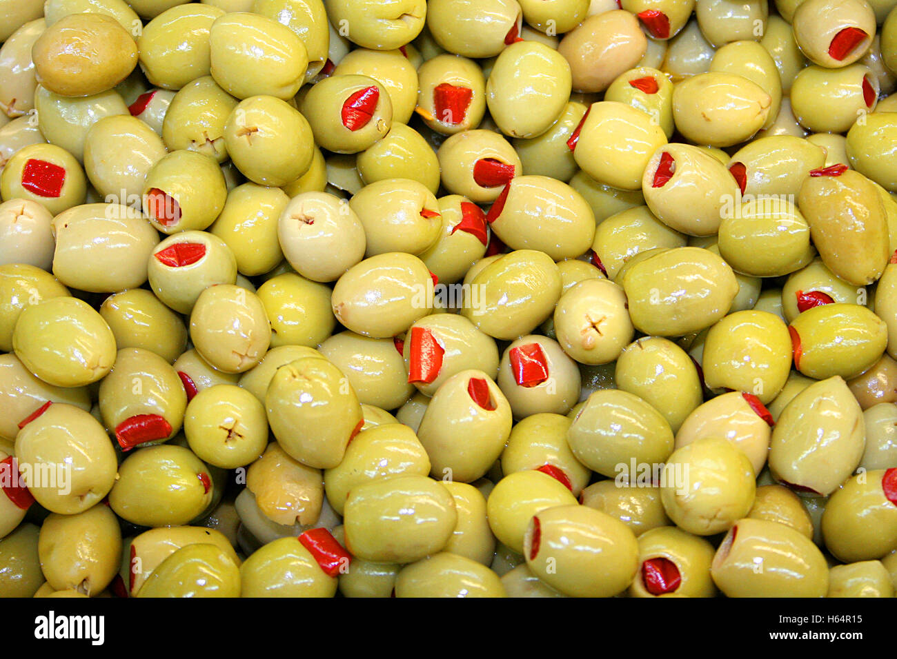 Red pepper Stuffed Green Olives Stock Photo Alamy