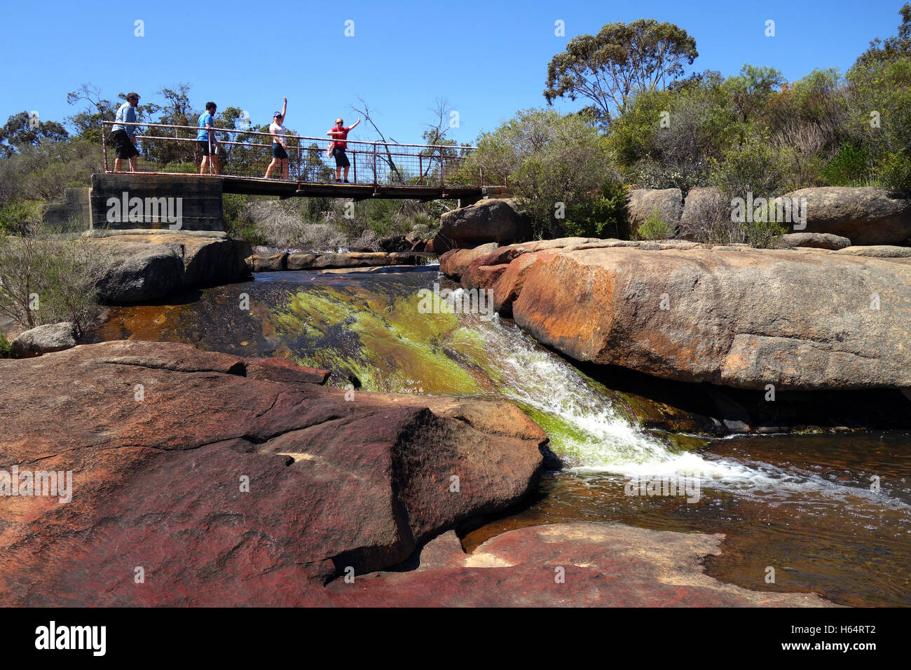 People crossing bridge over Hovea Falls, John Forrest National Park, Perth Hills, Western Australia. No MR or PR Stock Photo