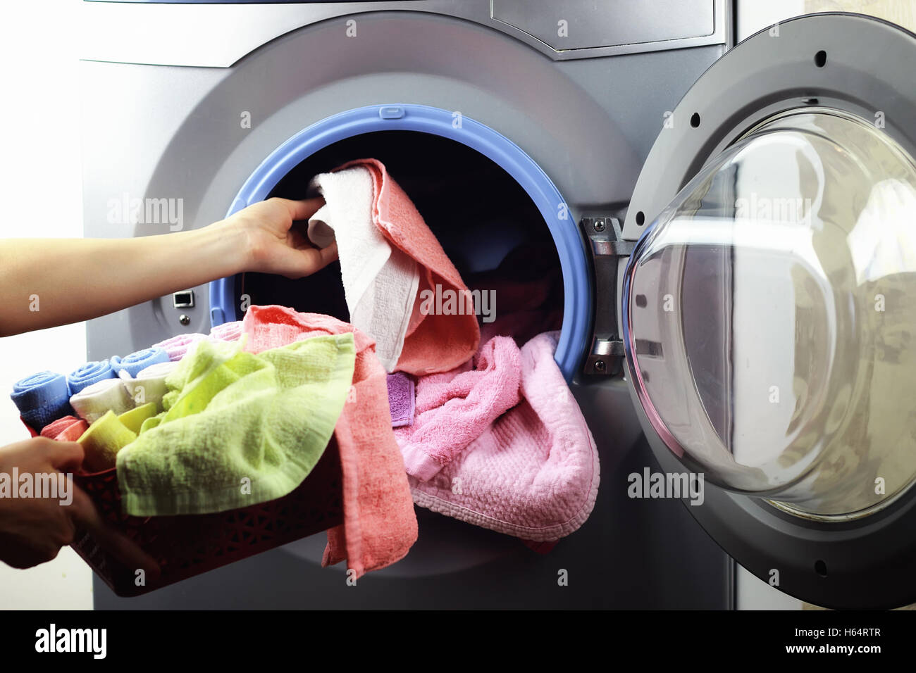 machine Washer hand put Stock Photo Alamy