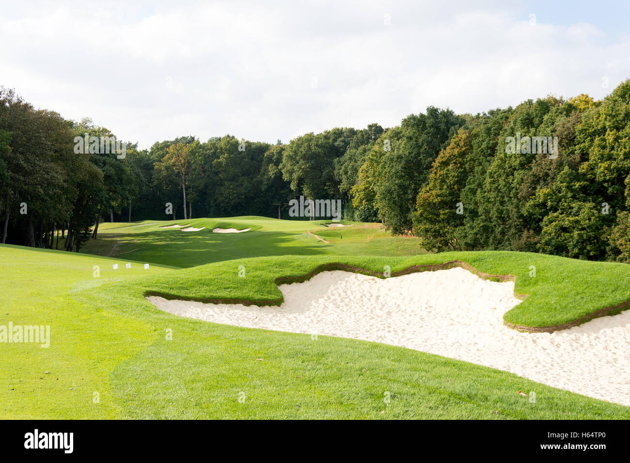 Golfing fairway and bunkers at The Wentworth Golf Club & Health Resort, Virginia Water, Surrey, England, United Kingdom Stock Photo