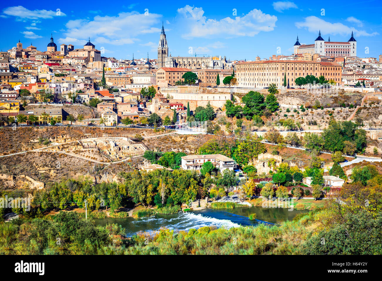 Toledo, Spain. Alcazar and the ancient city on a hill over the Tagus River, Castilla la Mancha medieval attraction of Espana. Stock Photo