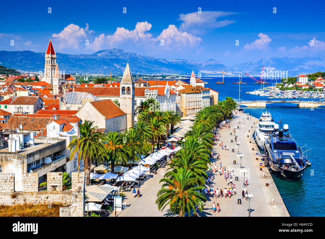 Trogir, Croatia. Sunny promenade along the pier of old Venetian town, Dalmatian Coast in Croatia. Stock Photo