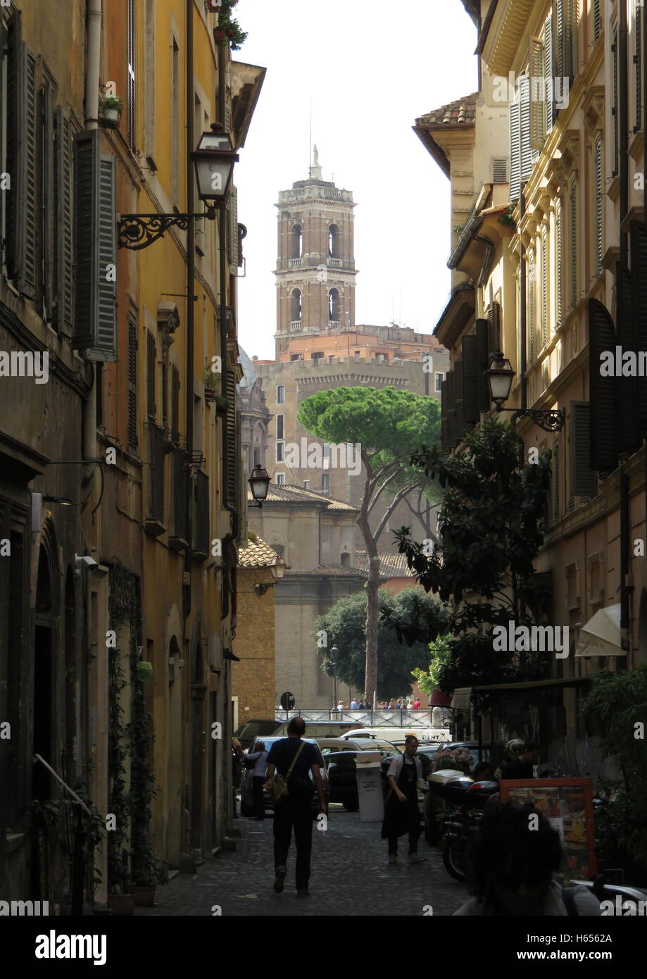 Rome street Via Madonna del Monti with Plazza Senatorio tower in background. Stock Photo
