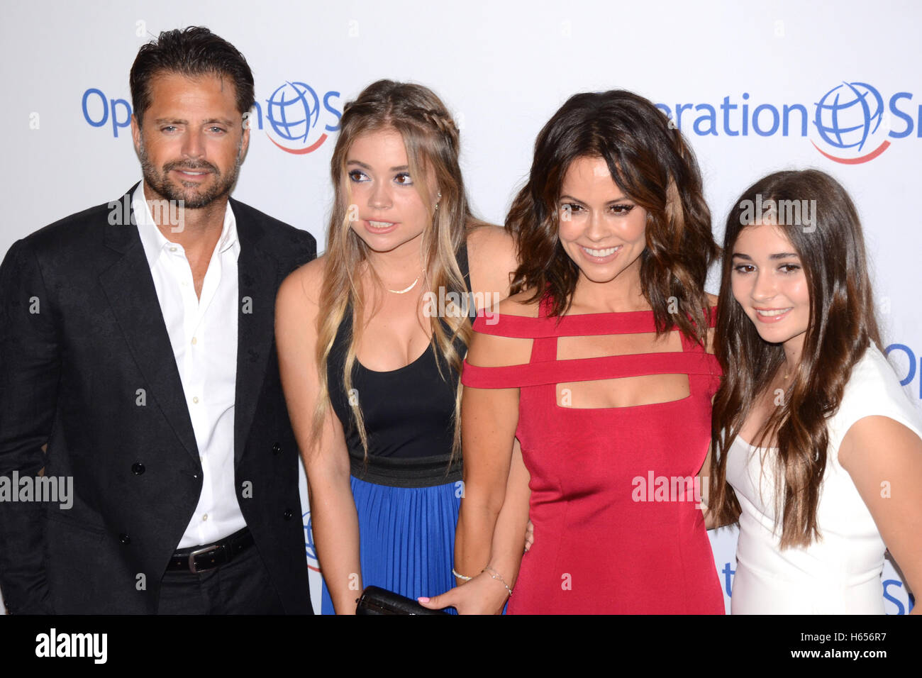 David Charvet (l) and Brooke Burke-Charvet (2nd from right) attends Operation Smile at the Beverly Wilshire Hotel, Beverly Hills California on October 2, 2015. Stock Photo