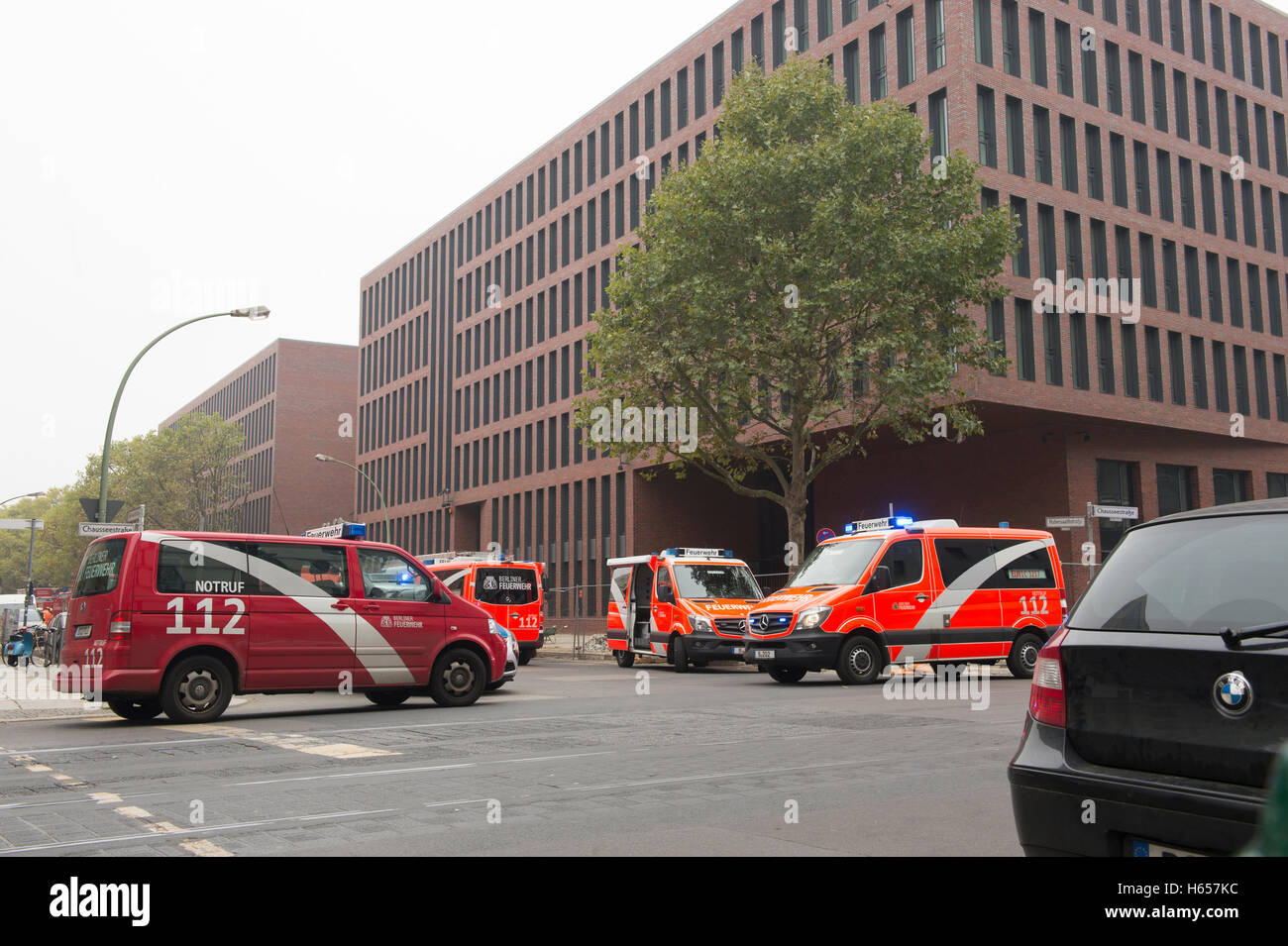 Berlin, Germany. 24th Oct, 2016. Fire brigade and police vehicles parking in front of the new headquarters of the German intelligence service (Bundesnachrichtendienst, BND) in Berlin, Germany, 24 October 2016. Acid was leaking in a battery room of a still empty office complex. PHOTO: PAUL ZINKEN/dpa/Alamy Live News Stock Photo