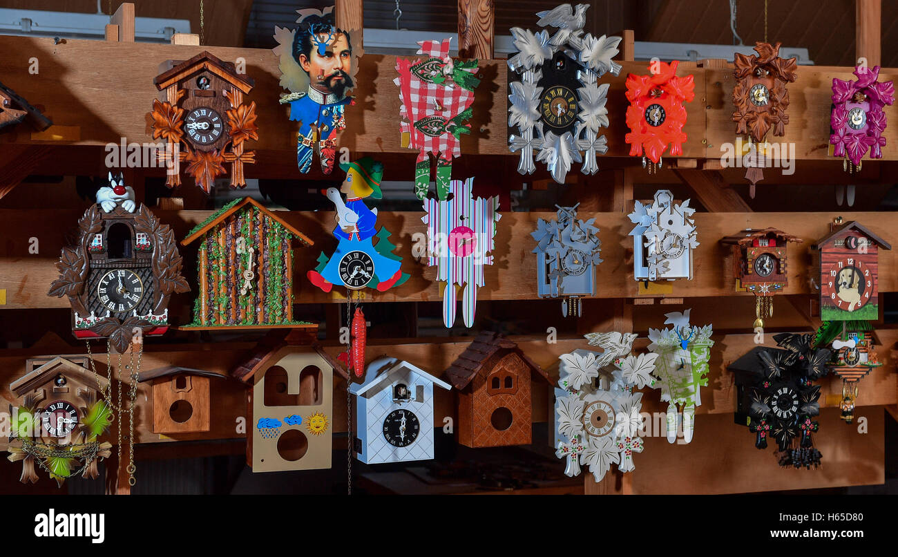 Gernrode, Germany. 13th Oct, 2016. Traditional and more curiously designed Cuckoo clocks on the company premises of the former production of the 'Harzer Uhrenfabrik' factory in Gernrode, Germany, 13 October 2016. In the museum of the factory hang and stand over 100 mechanical clocks. Founded in 1948, the company was the only factory outside the Black Forest to produce cuckoo clocks. In 2009, the factory had to file for insolvency as a result of the financial crisis. Now the association wants to return life to the rooms. Photo: Hendrik Schmidt/dpa/Alamy Live News Stock Photo