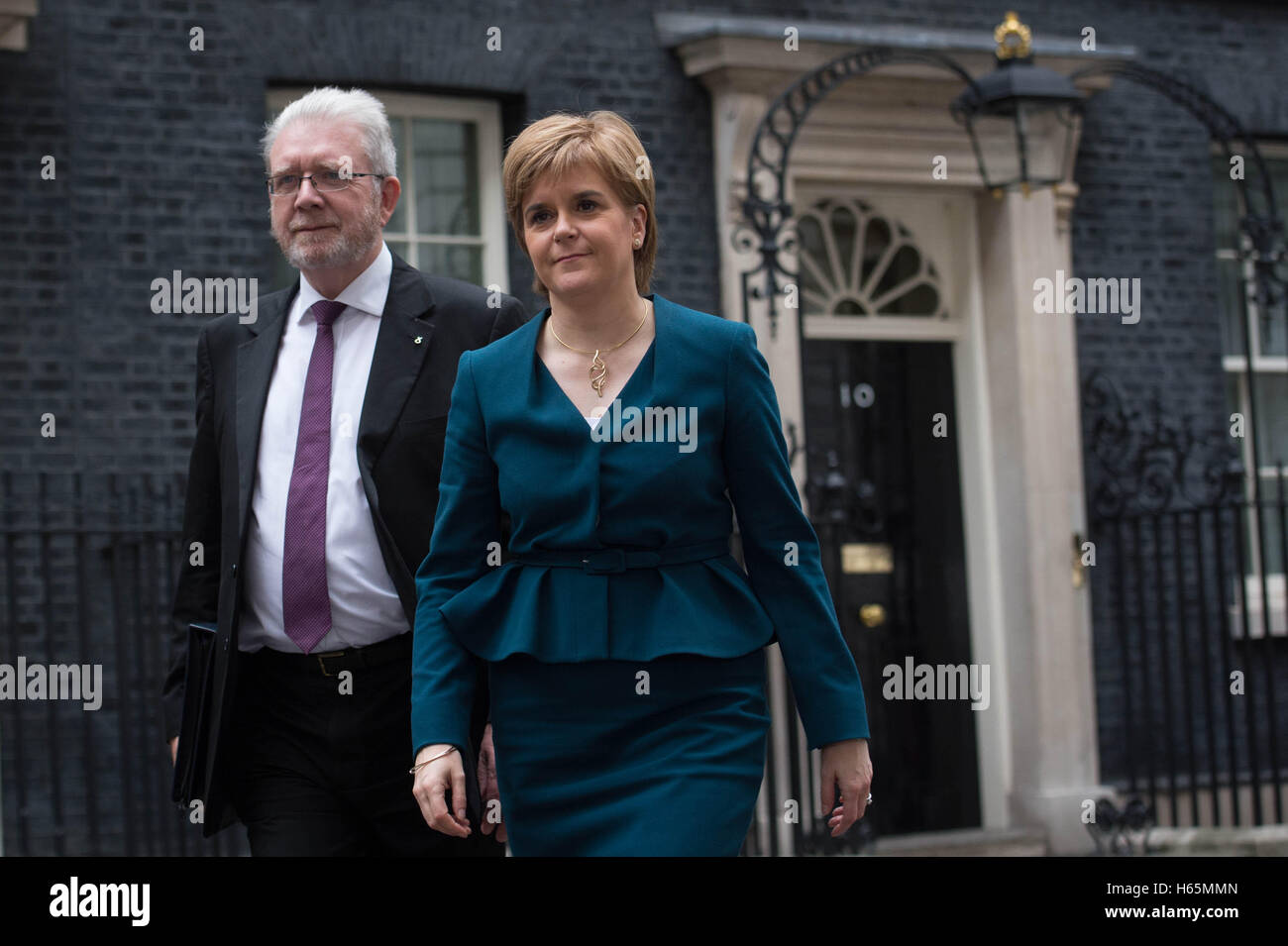 Scottish First Minister Nicola Sturgeon leaves 10 Downing Street in London today with her Brexit minister, Michael Russell after a meeting with Theresa May the leaders of the devolved parliaments of the British Isles to discuss the EU. Stock Photo
