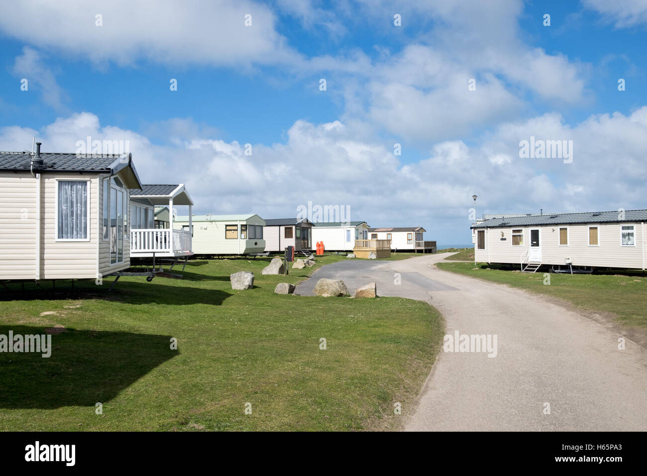 Static caravans on the Perran Sands caravan park on a sunny summers day nr Perranporth, Cornwall, UK Stock Photo