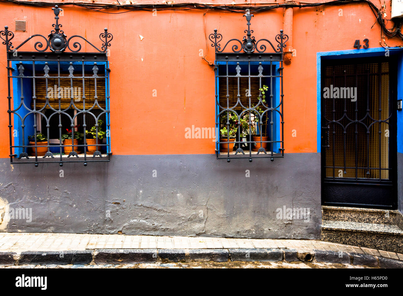 Orange walled house front in the old town of Tarazona Stock Photo