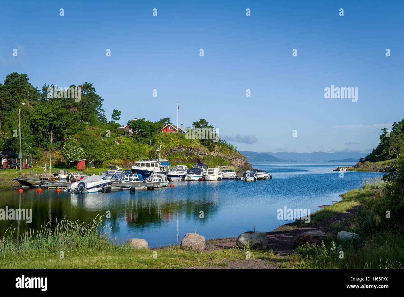 Typical nordic bay with recreational boats moored Stock Photo