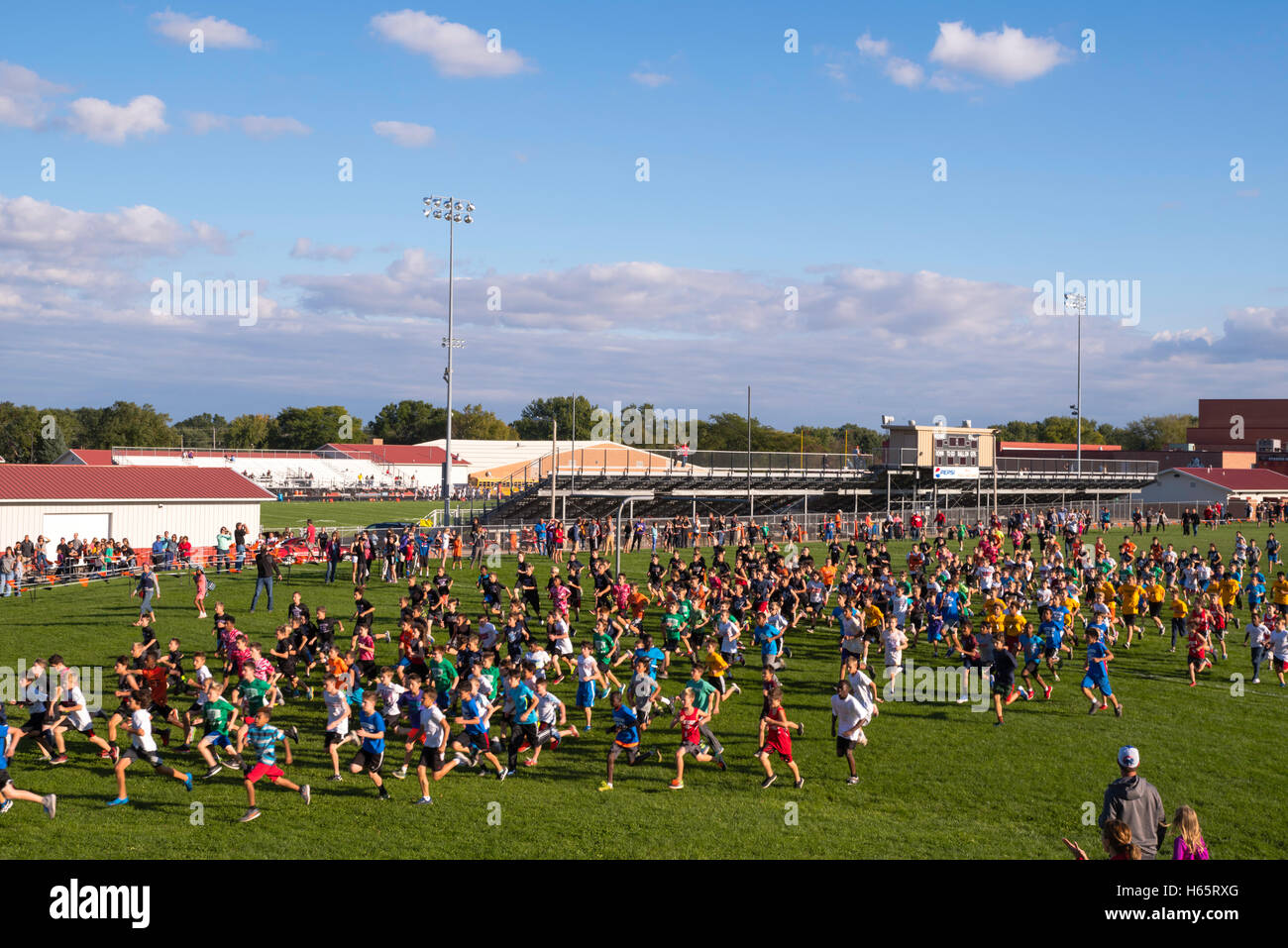Photographs of a middle school cross country meet held in Verona