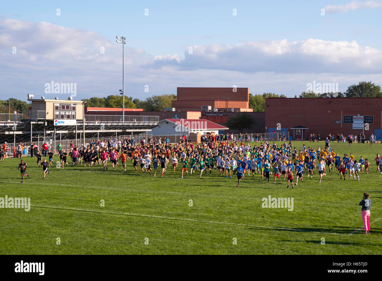 Photographs of a middle school cross country meet held in Verona