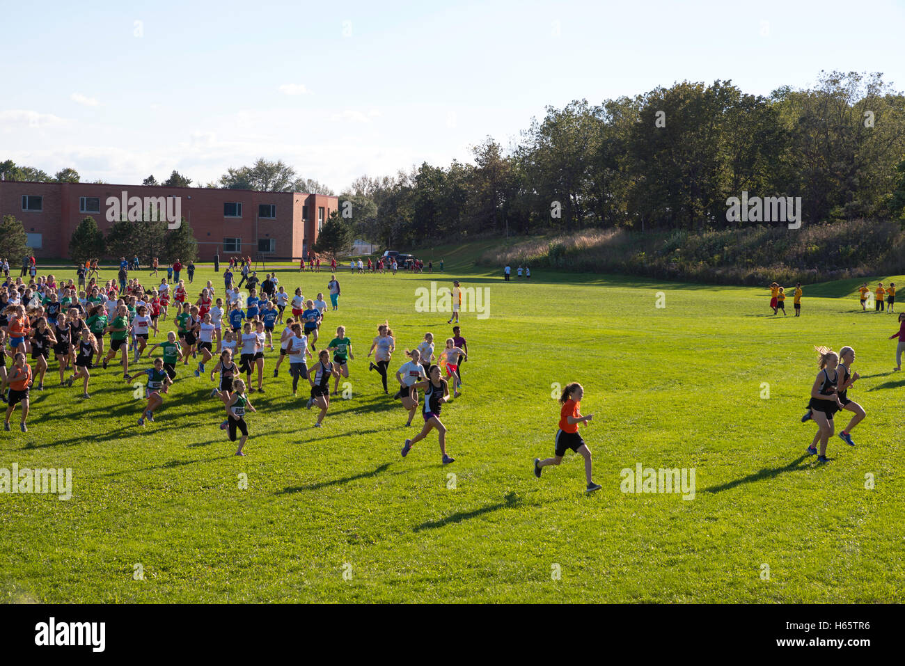 Photographs of a middle school cross country meet held in Verona