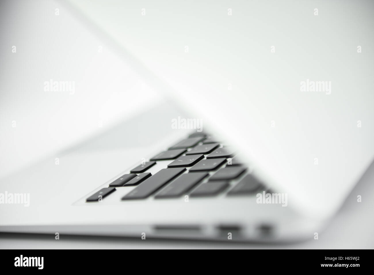 Laptop isolated on white background Stock Photo - Alamy
