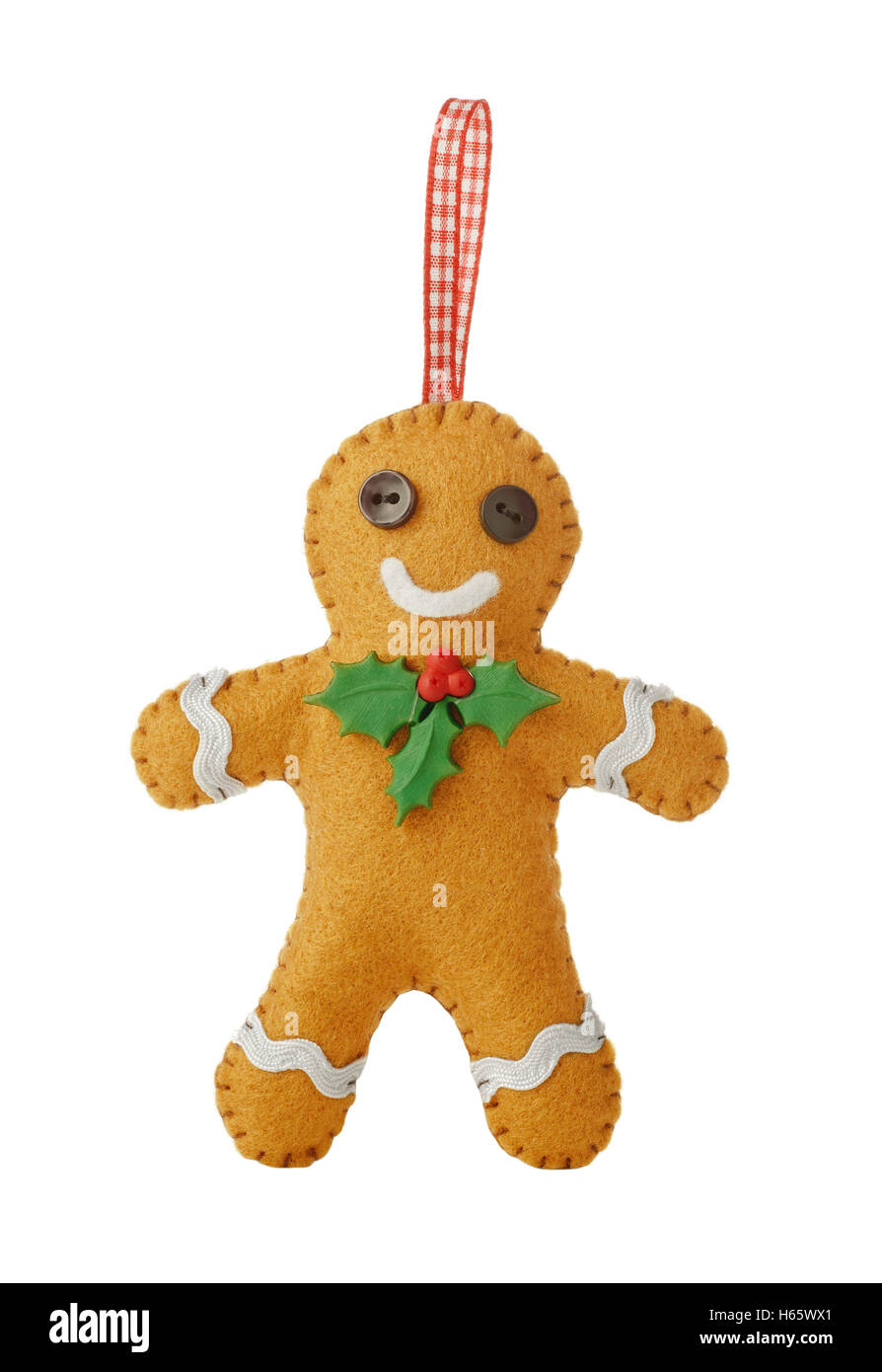 Handmade felt gingerbread man with red ribbon for Christmas Stock Photo