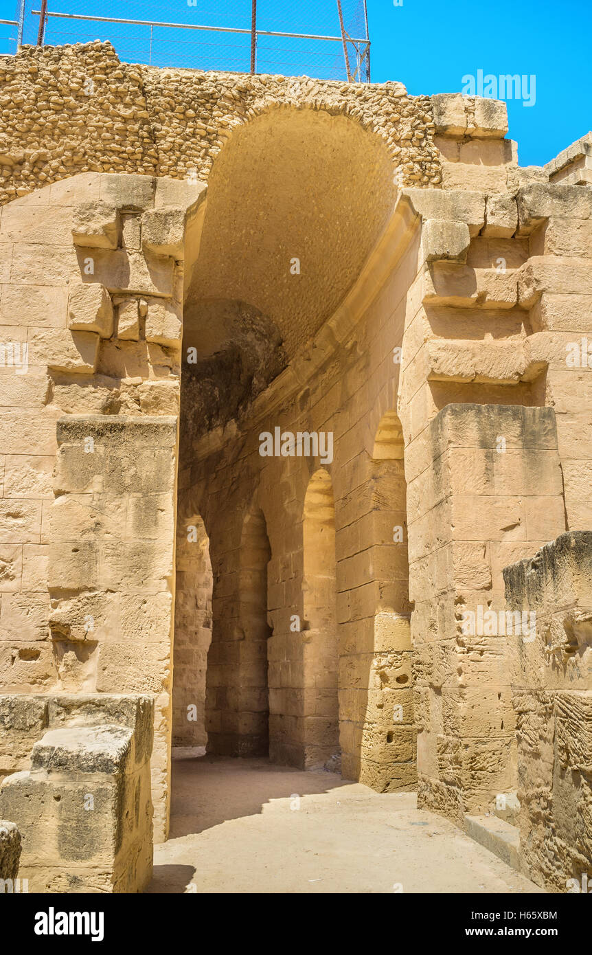 The narrow hall surrounds the arena of Roman amphitheatre,  El Jem. Stock Photo