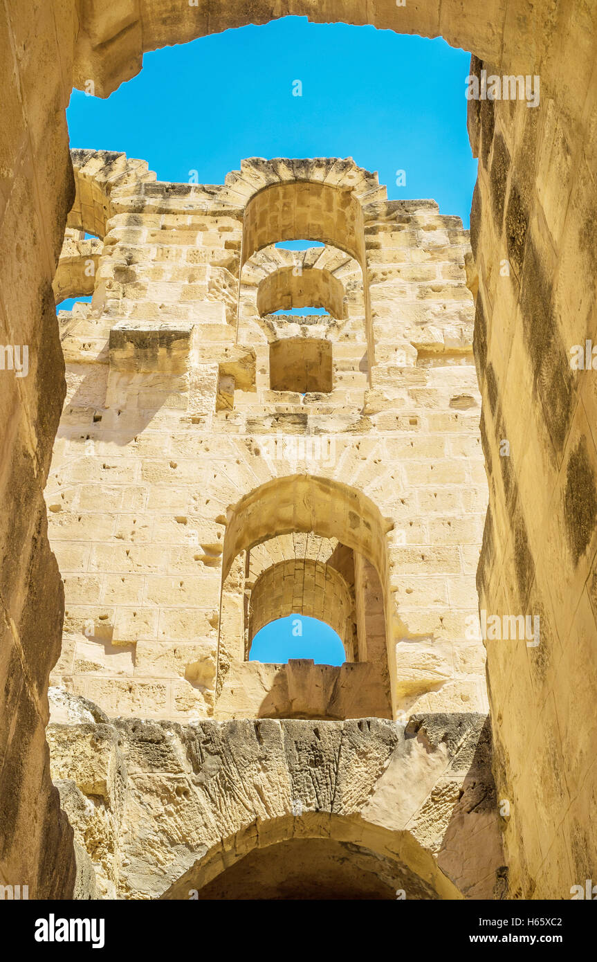 The rows of the stone arches rise from the outer wall of the ancient ...