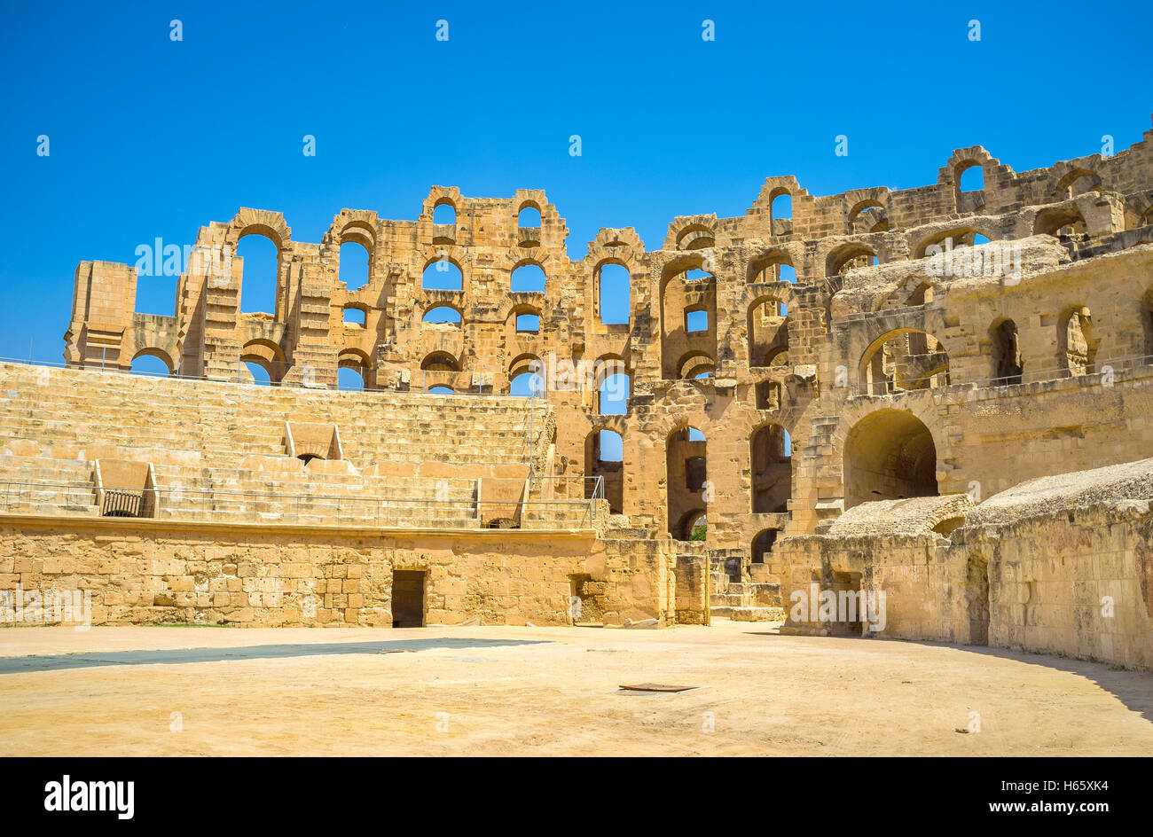 The ruins of amphitheatre's walls looks like the stone laces, El Jem, Tunisia. Stock Photo