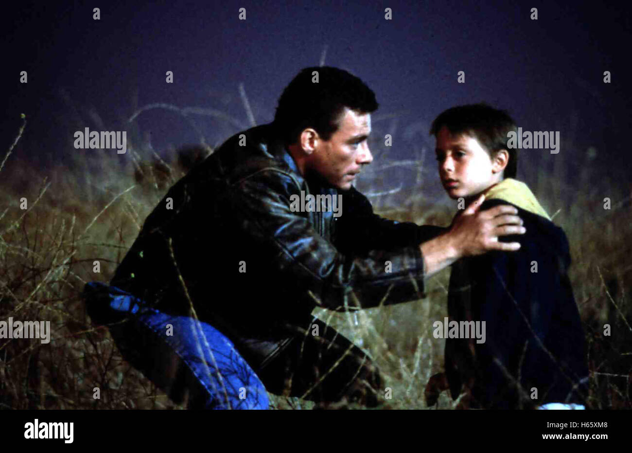 Ohne Ausweg aka.  Nowhere to Run (1993), Director: Robert Harmon, Actors/Stars: Jean-Claude Van Damme, Rosanna Arquette, Kieran Culkin Stock Photo