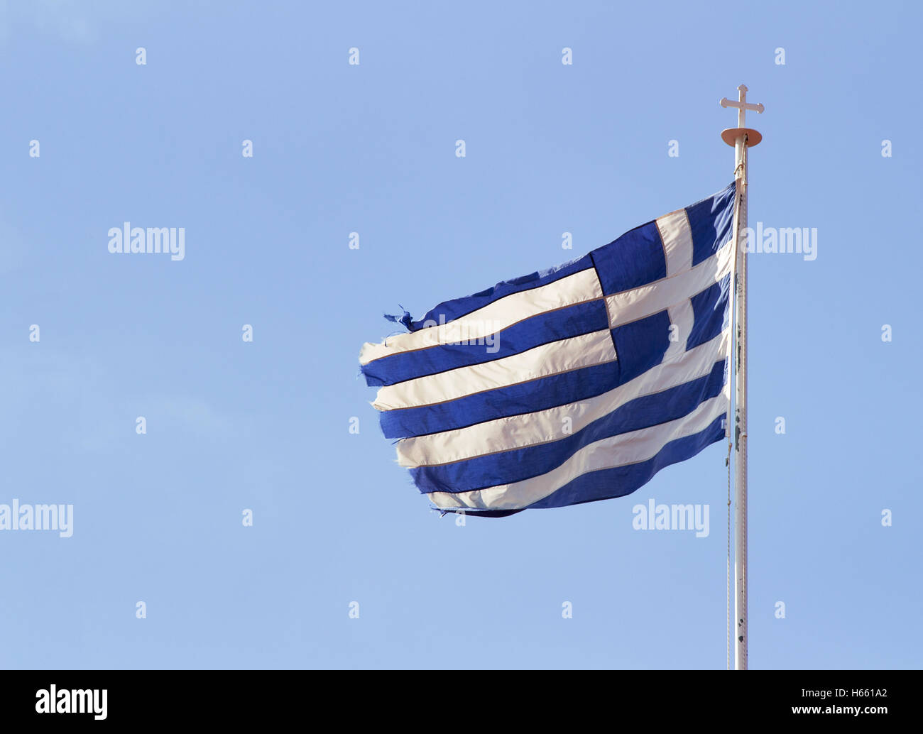Greek flag on Orthodox Monastery. Cyprus. Stock Photo