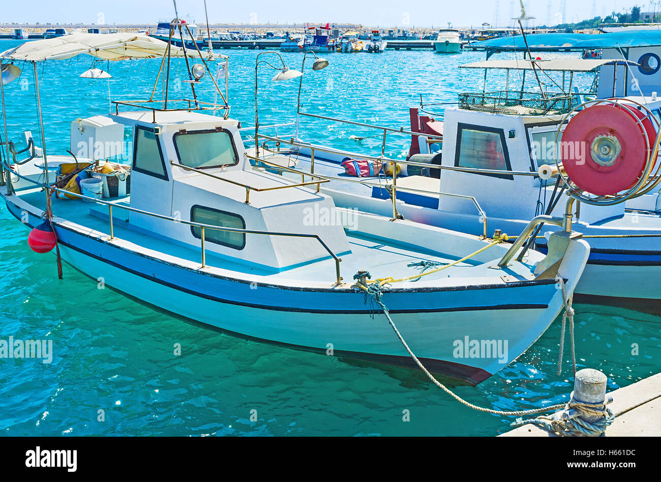 The local fishing boats can be hired by tourists for the trips along the coast or fishing, Zugi, Cyprus. Stock Photo