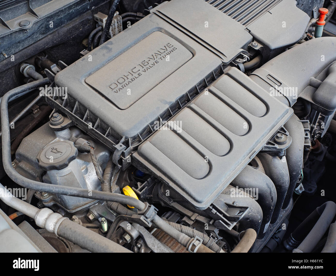 Under the hood car engine in the dust Stock Photo Alamy