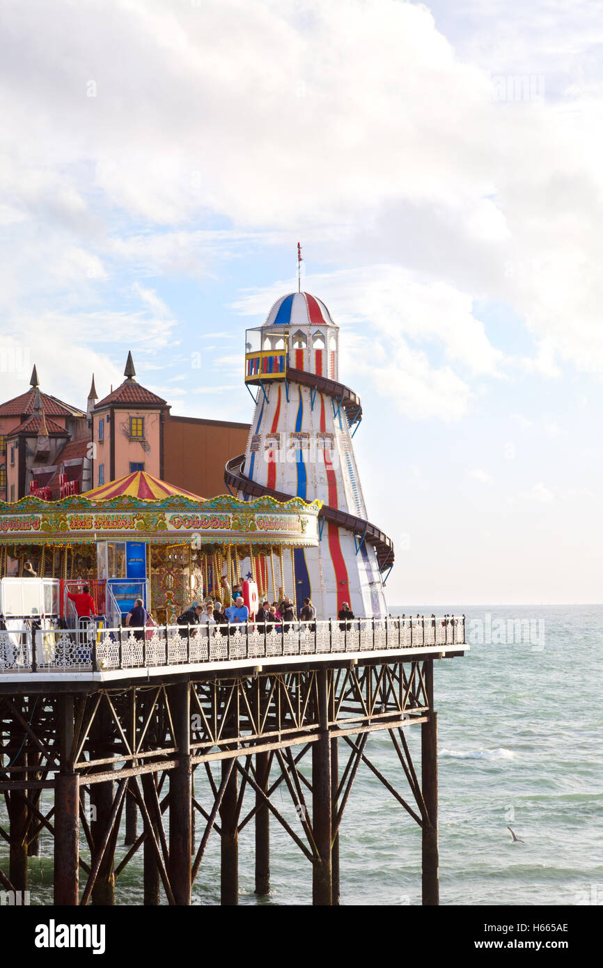 The helter skelter and funfair, Brighton Pier, Brighton, East Sussex England UK Stock Photo