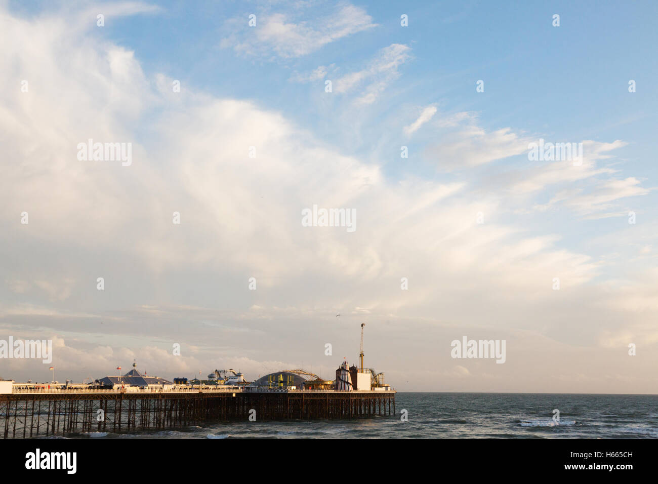 Blue sky over Brighton Pier in autumn, Brighton, East Sussex England UK Stock Photo