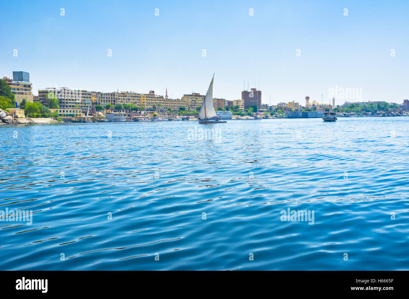 The felucca trip is the best choice for those, who wants to relax and enjoy the views, Aswan, Egypt. Stock Photo