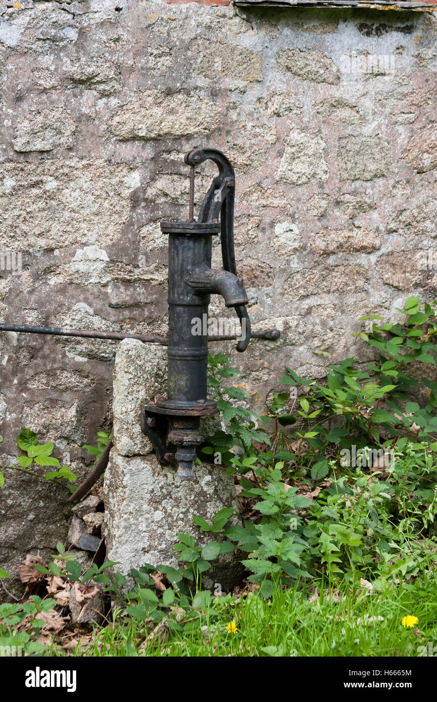old cast iron hand water pump Stock Photo Alamy