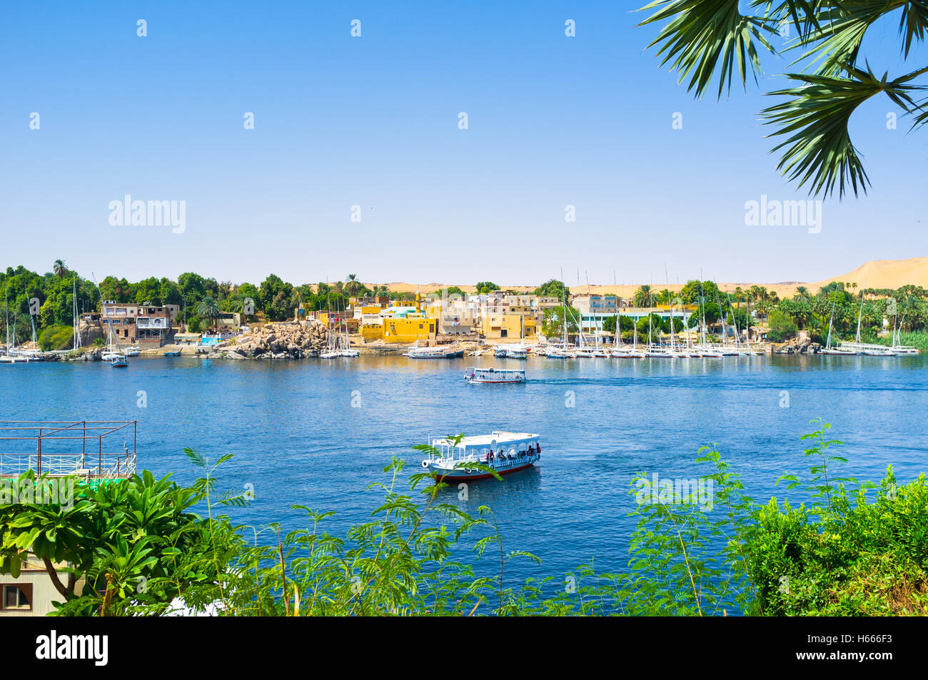 The view on the Nubian village, located on the Kitchener's island from the Kornish al Nile, Aswan, Egypt. Stock Photo
