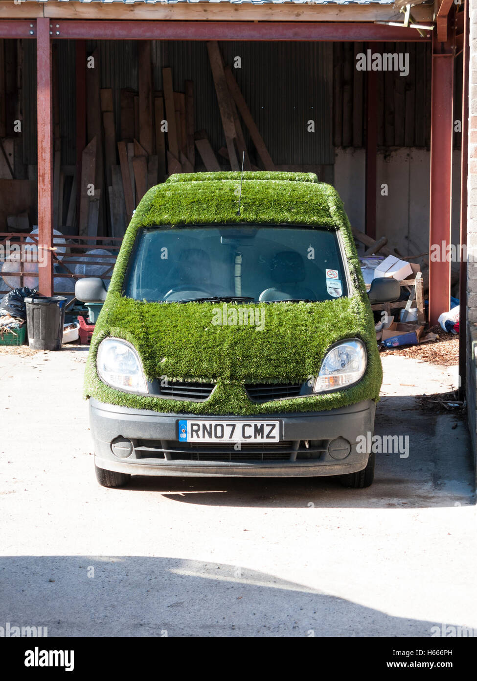 van covered in artificial grass Stock Photo Alamy