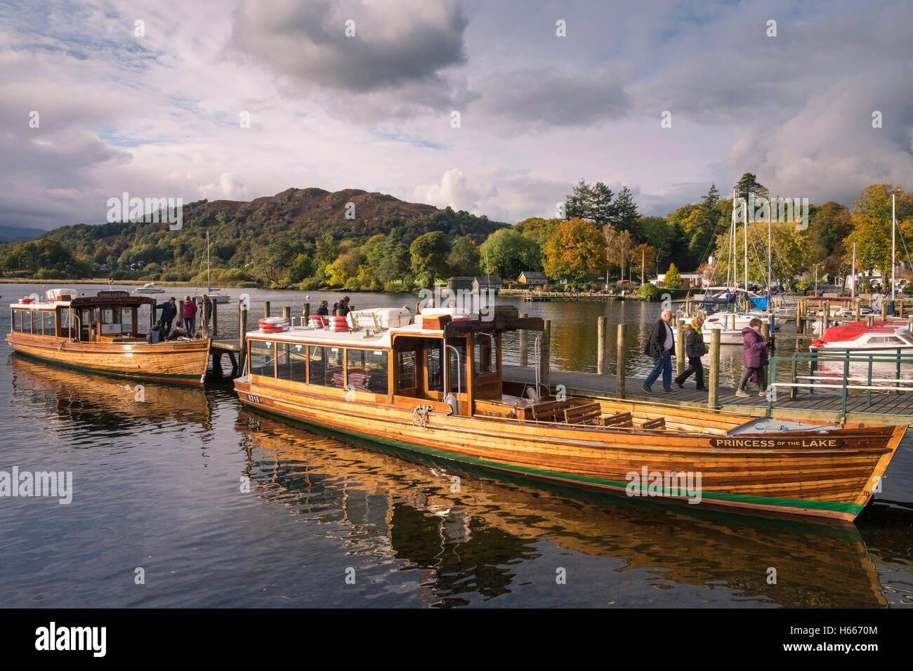 Tourists departing cruise boats at Waterhead, Ambleside on Lake