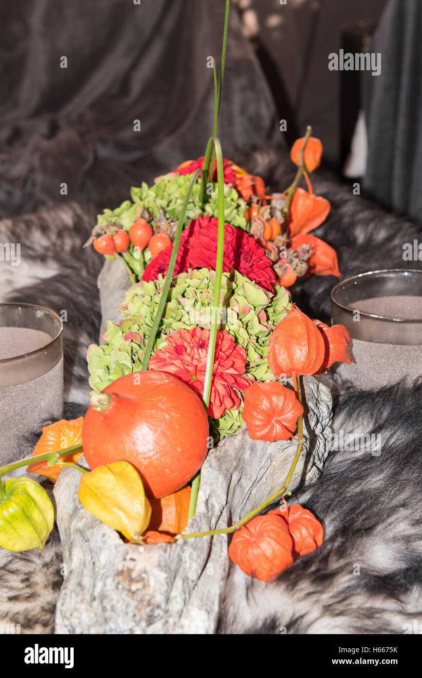 Autumn decoration in a bowl on a fur Stock Photo