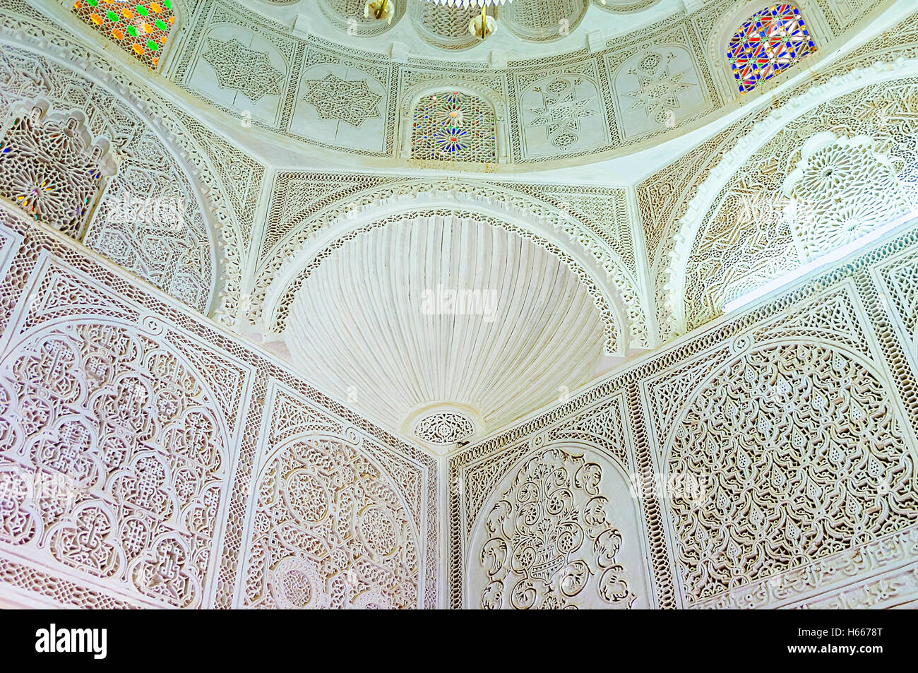 The white islamic patterns made of carved plaster on the wall of Zaouia ...