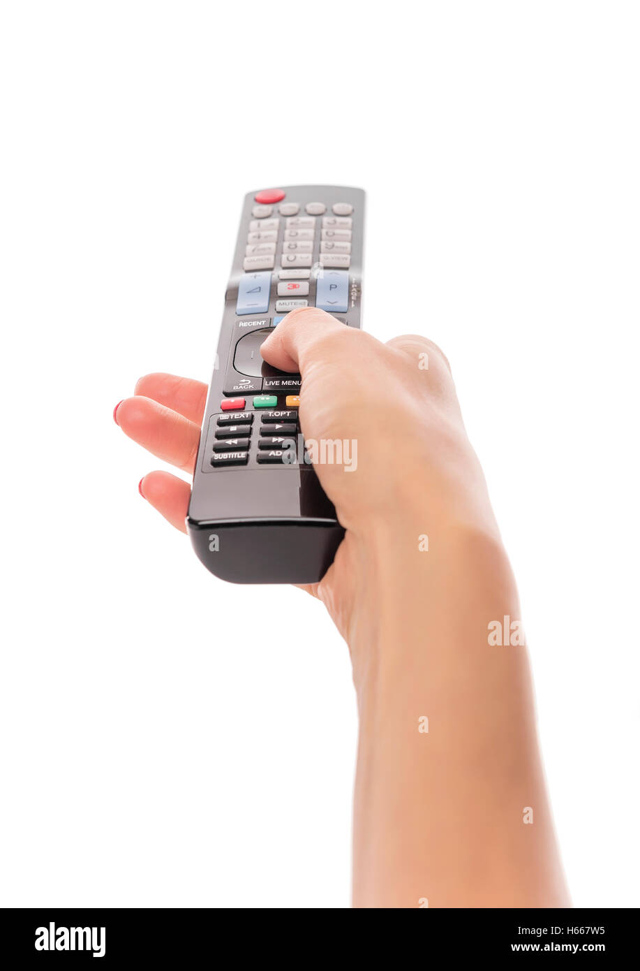 Hand holds remote on a white background. Stock Photo
