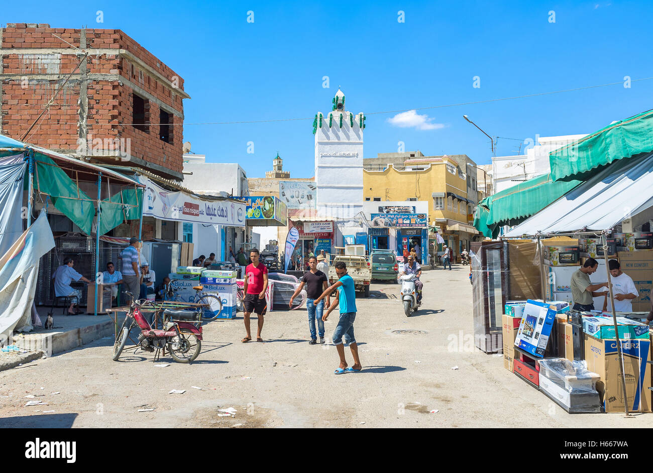 The arabic market is crowded and noisy place with the wide range of goods on each taste Stock Photo