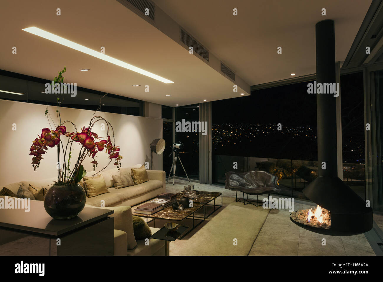 Modern luxury fireplace and home showcase living room at night Stock ...