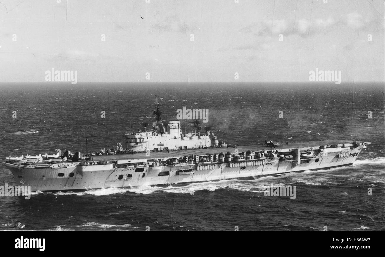 Royal Navy aircraft carrier HMS Eagle (R05) at sea 1951 Stock Photo