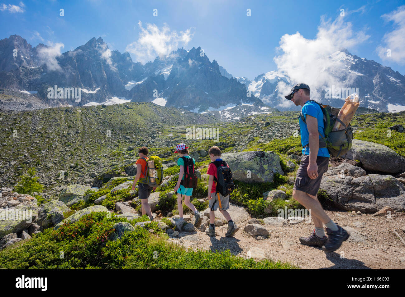 Family hiking on the Grand Balcon Nord, Chamonix Valley, French Alps, France. Stock Photo