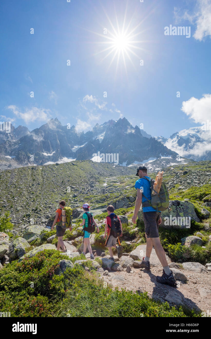 Family hiking on the Grand Balcon Nord, Chamonix Valley, French Alps, France. Stock Photo