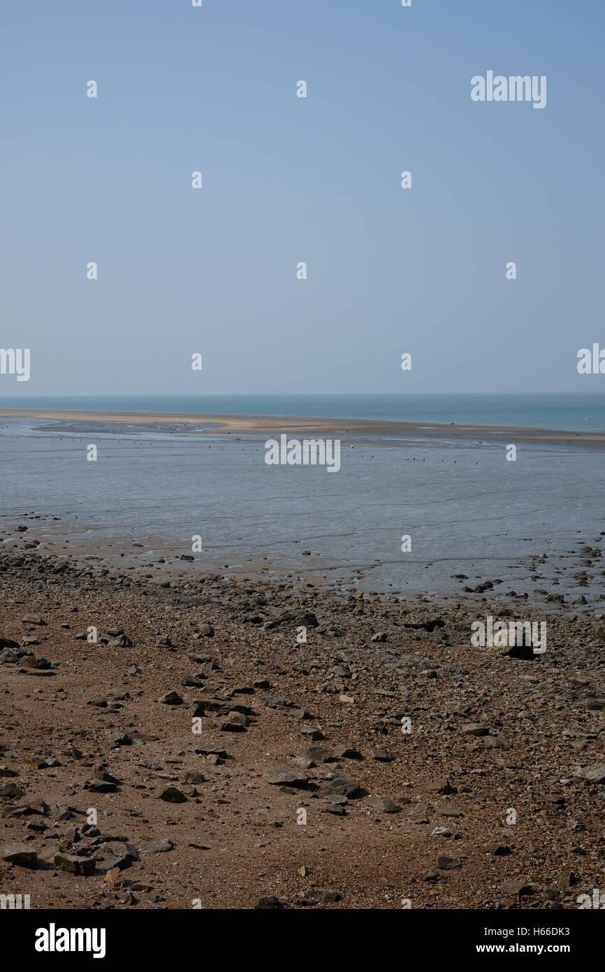 Beach with rocks and clear sky Stock Photo - Alamy
