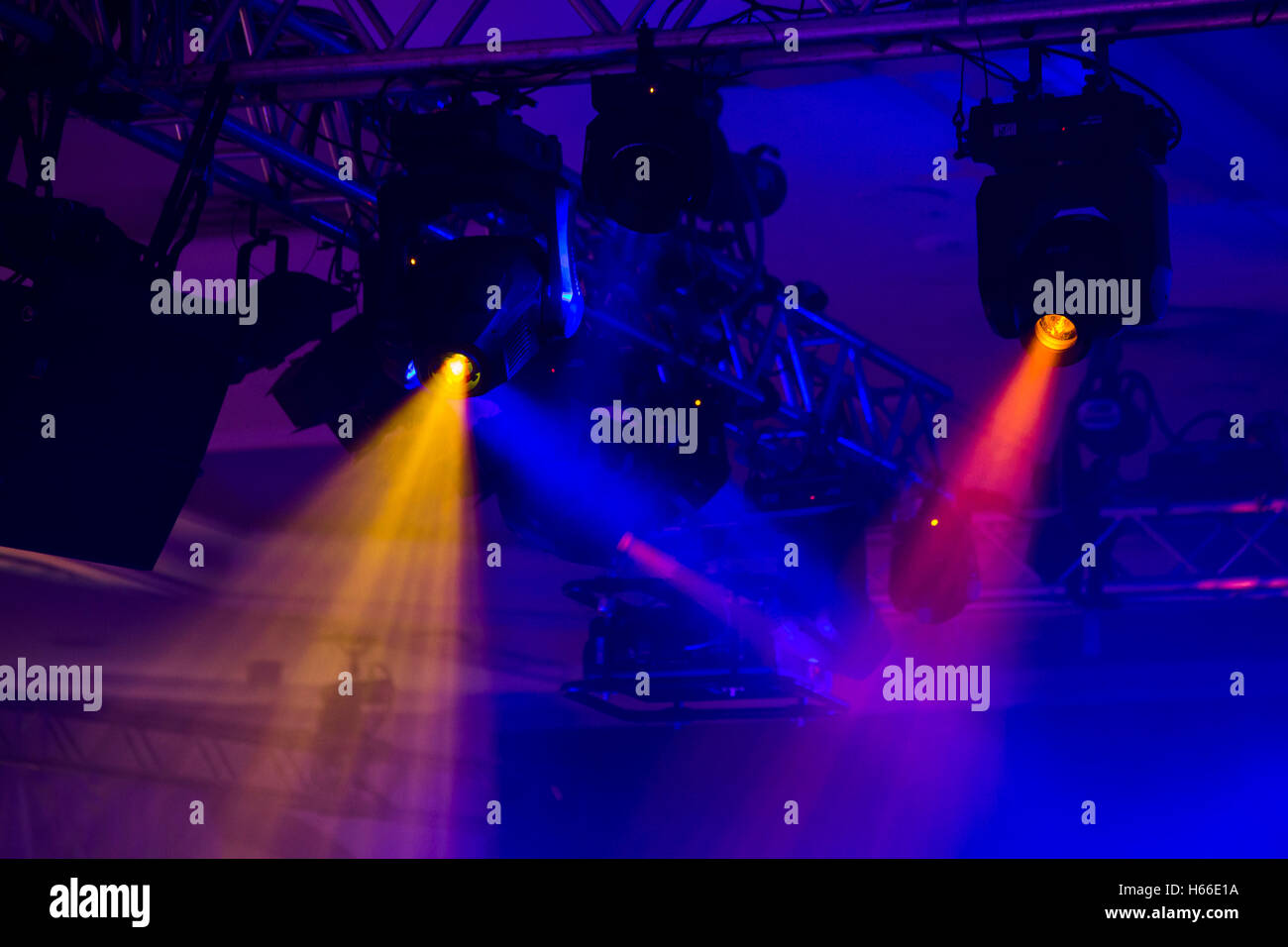 An Awards ceremony in a  large hotrel and the stage is lit by colourful lights. Stock Photo