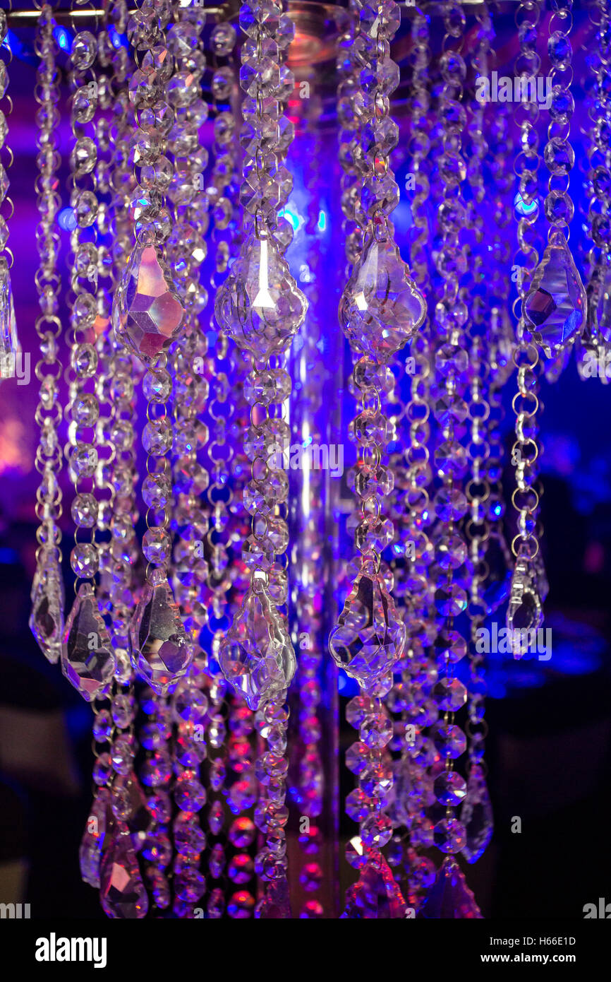An Awards Ceremony Ina Large Hotrel Hanging Table Decorations Lit