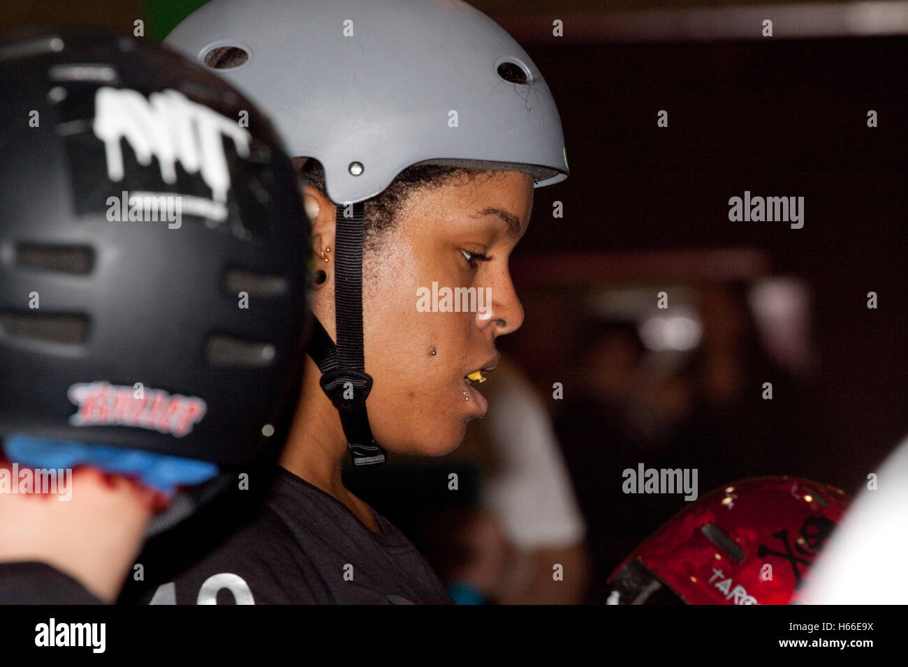 British Afro Caribbean woman roller derby skater Stock Photo