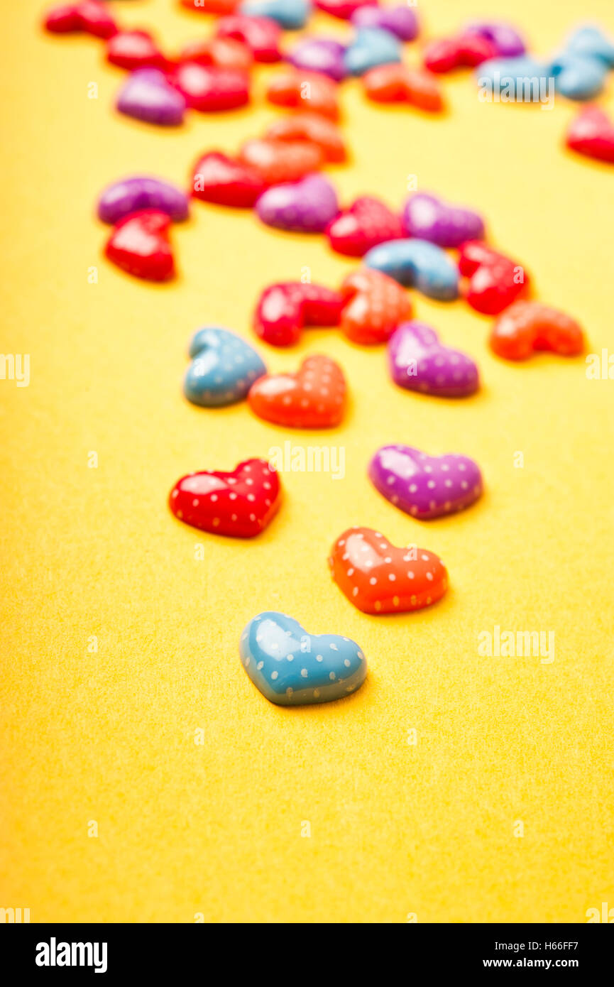 colorful heart shaped confetti, love concept Stock Photo