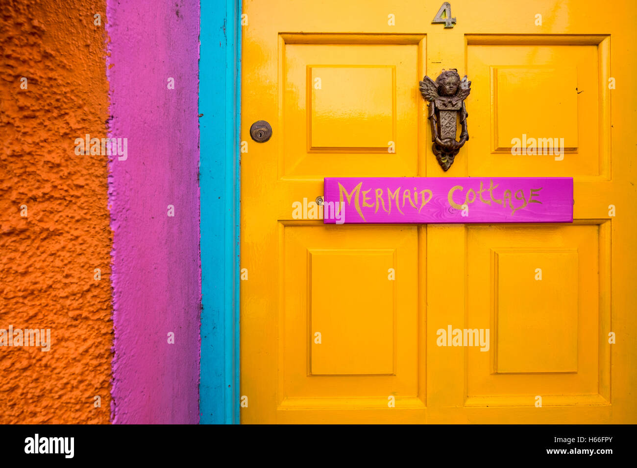 Detail of the colourful front door of Mermaid cottage in Kinsale, County Cork, Ireland Stock Photo