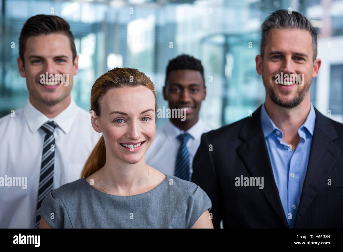 Portrait of businesspeople in office Stock Photo - Alamy